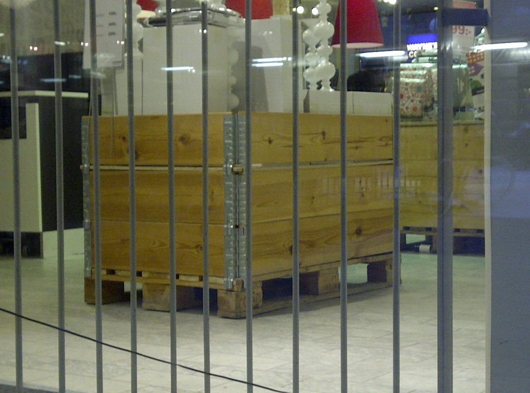 Pallet Collars as packing crates, used to display merchandise.
